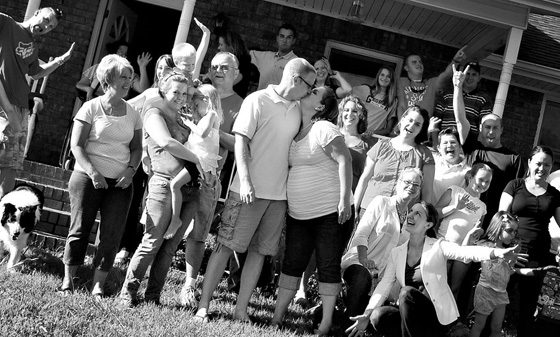 A goofy black-and-white group photo from a Love Drop for the Withrow family